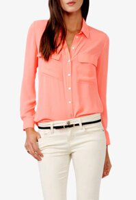 Balance a colorful top with neutral pants. 